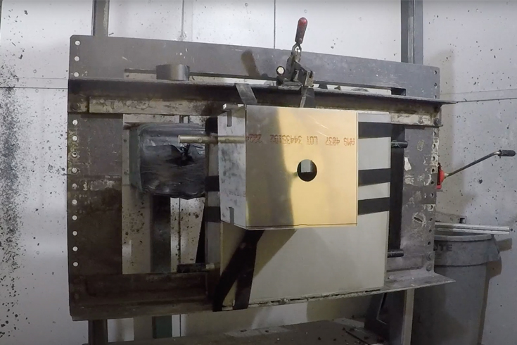 Ballistic laboratory testing set up for Guardian AR1000 plate for spall testing 20 mil and spall sleeve